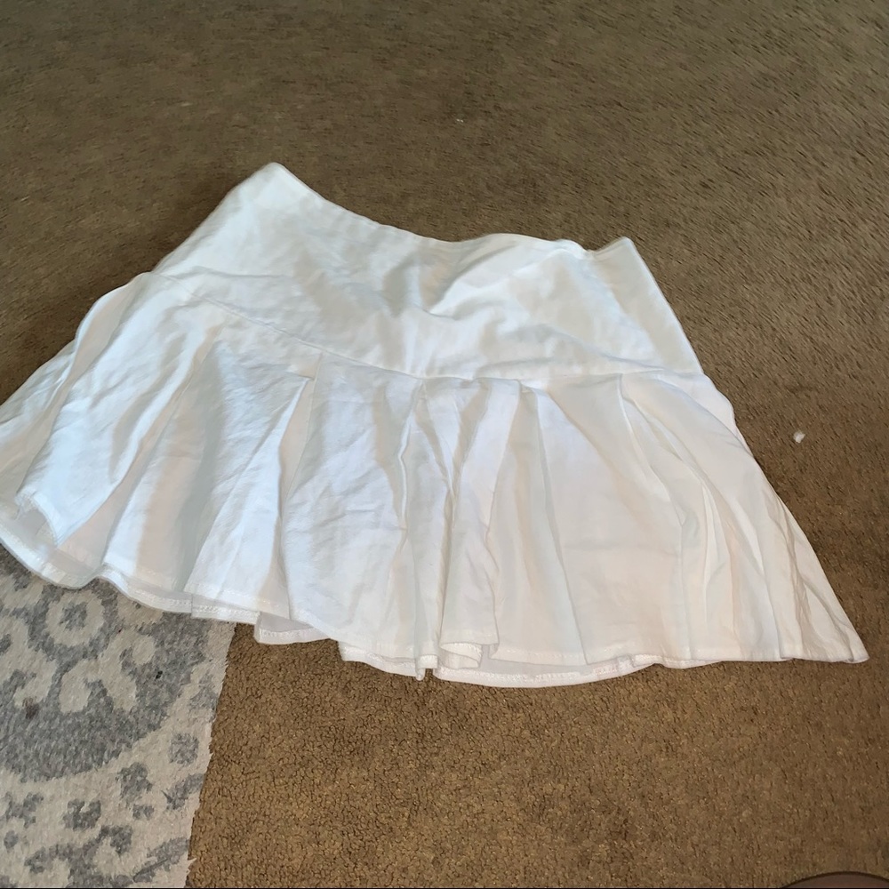White pleated skirt